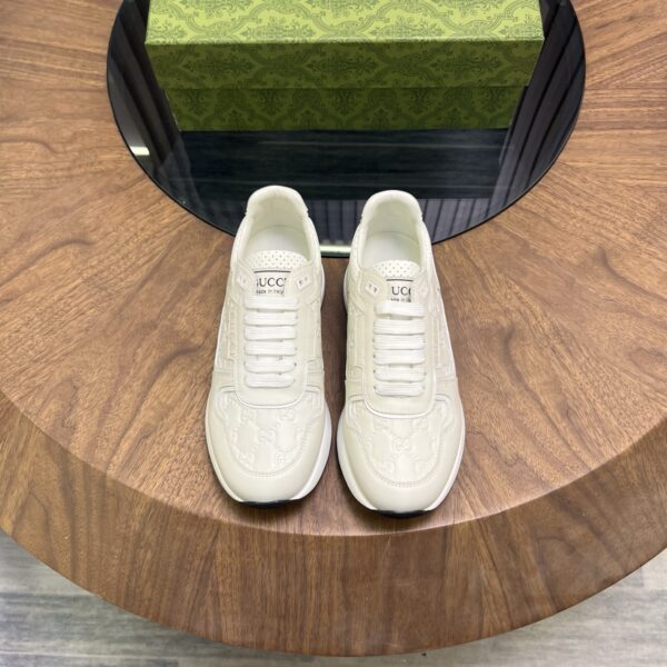 Gucci Cowhide Leather And Classic Embossed Low Cut Sneakers - Image 2