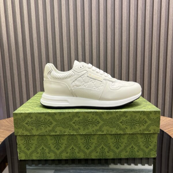 Gucci Cowhide Leather And Classic Embossed Low Cut Sneakers - Image 3