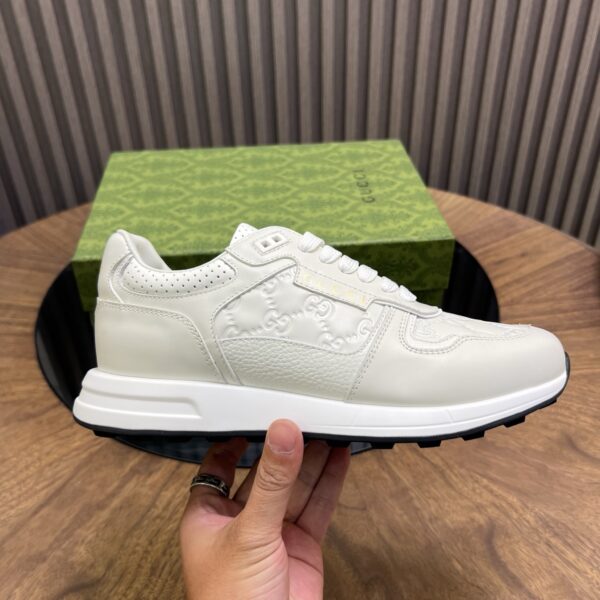 Gucci Cowhide Leather And Classic Embossed Low Cut Sneakers - Image 4