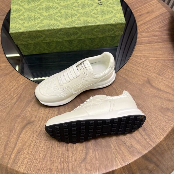 Gucci Cowhide Leather And Classic Embossed Low Cut Sneakers - Image 5