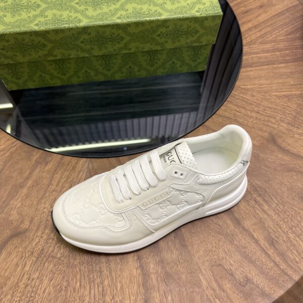 Gucci Cowhide Leather And Classic Embossed Low Cut Sneakers - Image 6